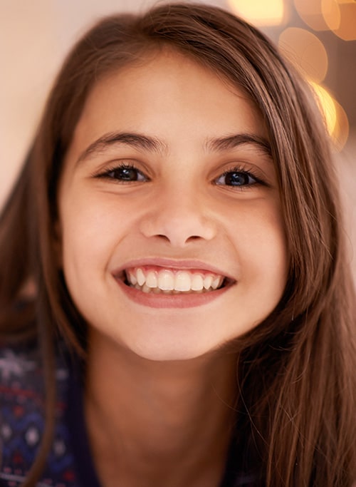 Girl smiling at Young Orthodontics in Wellington, FL